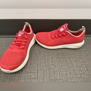 Coral pink Crocs Lite Stride shoes